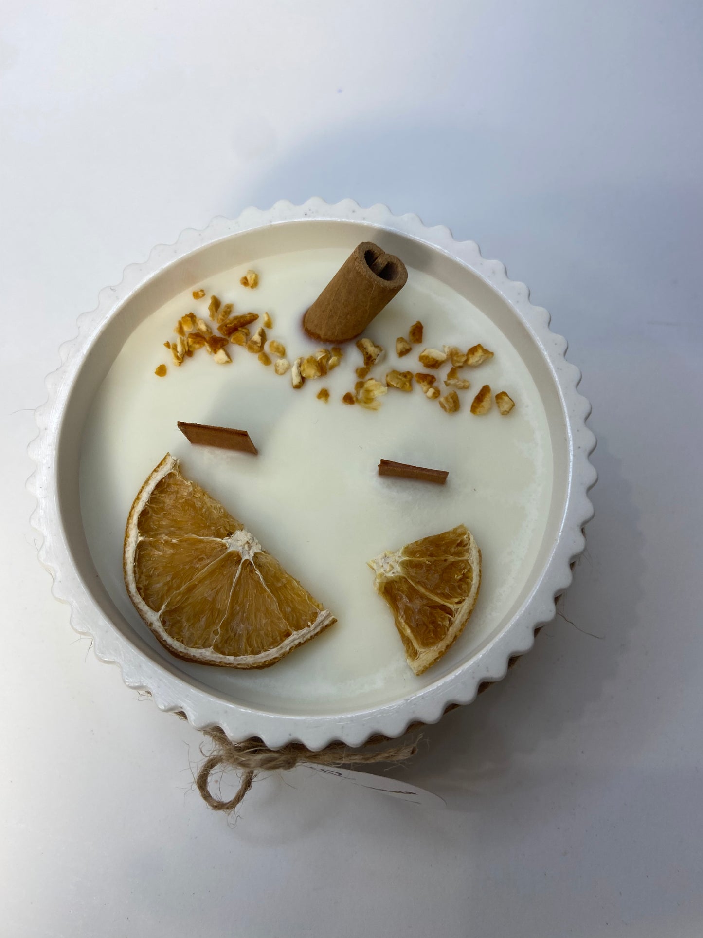 Vela de soja aroma naranja y canela en envase artesanal