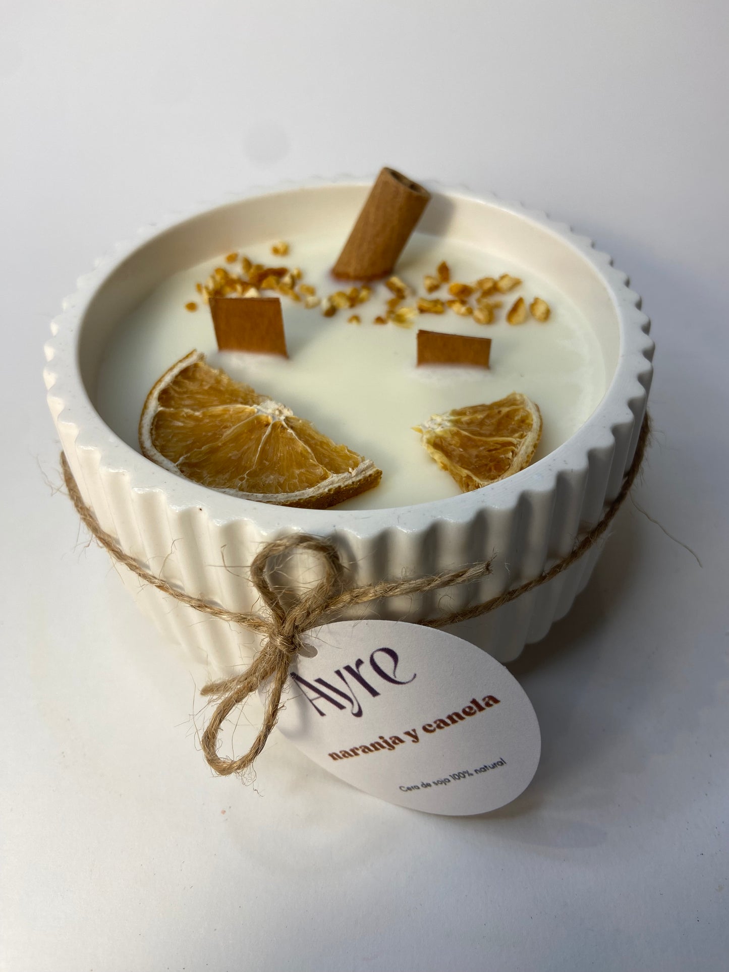 Vela de soja aroma naranja y canela en envase artesanal