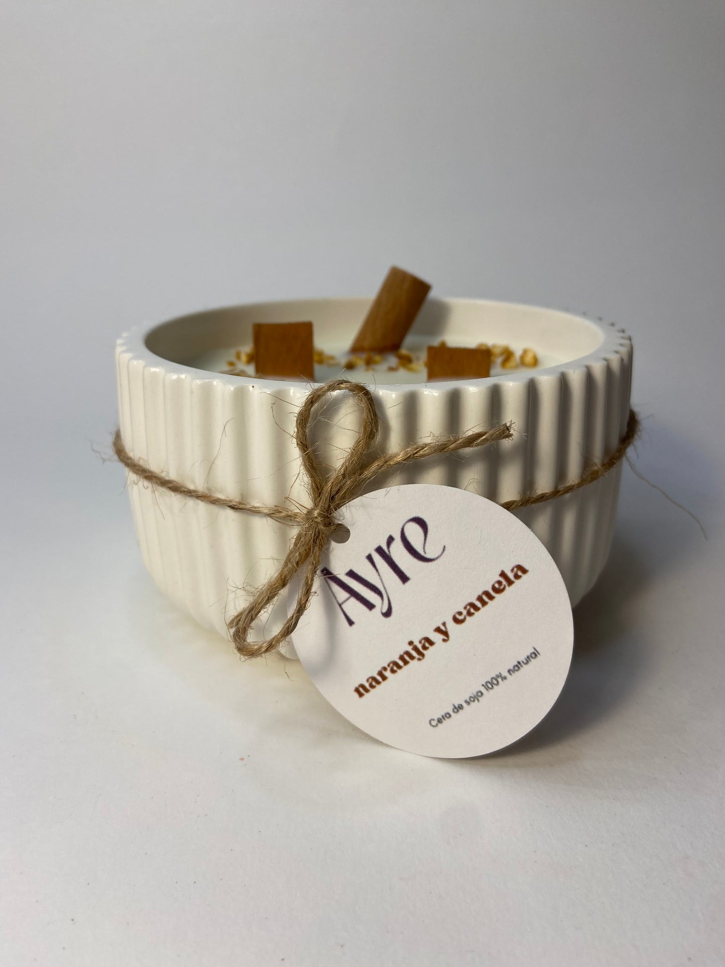 Vela de soja aroma naranja y canela en envase artesanal