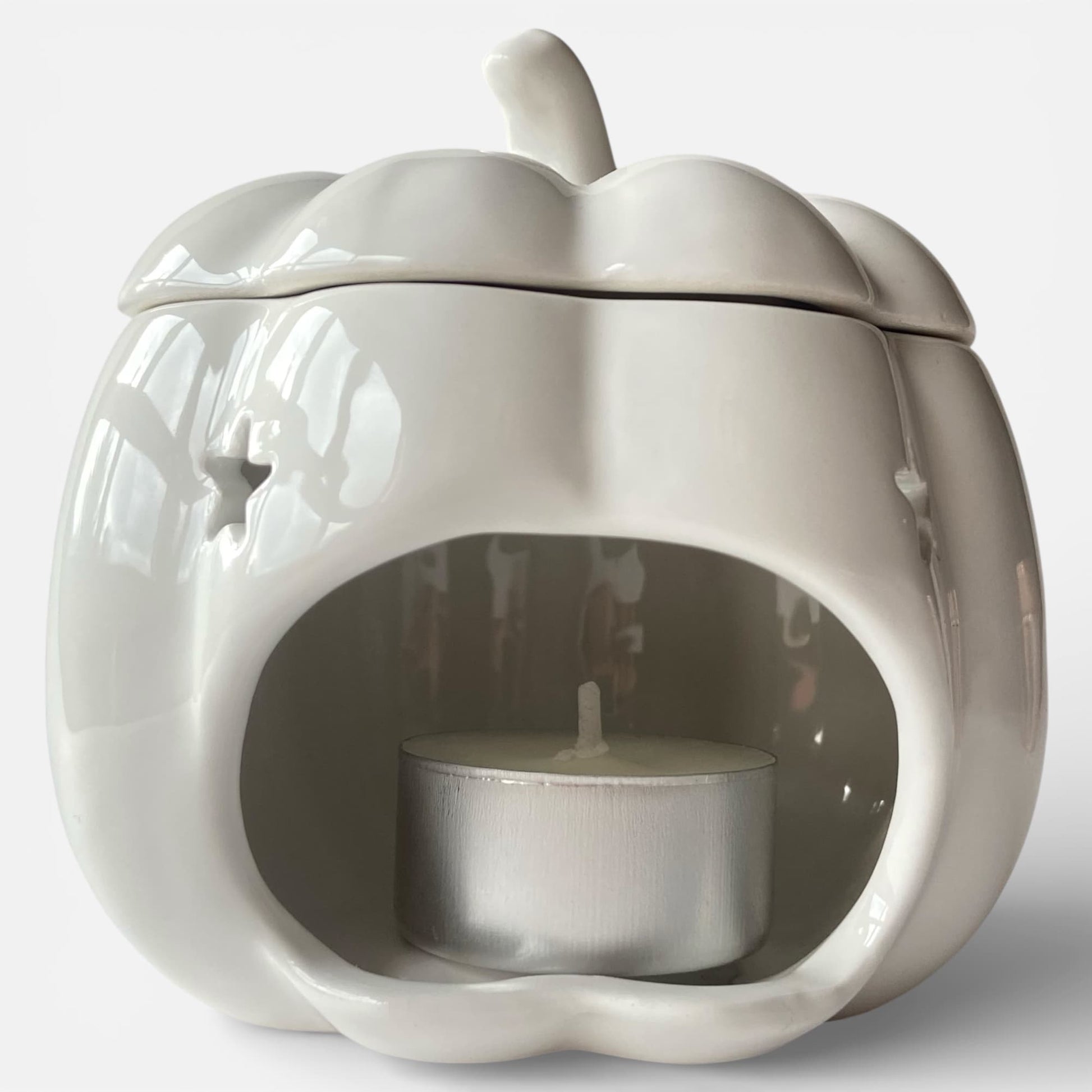 Quemador de cera calabaza con vela de té en su interior