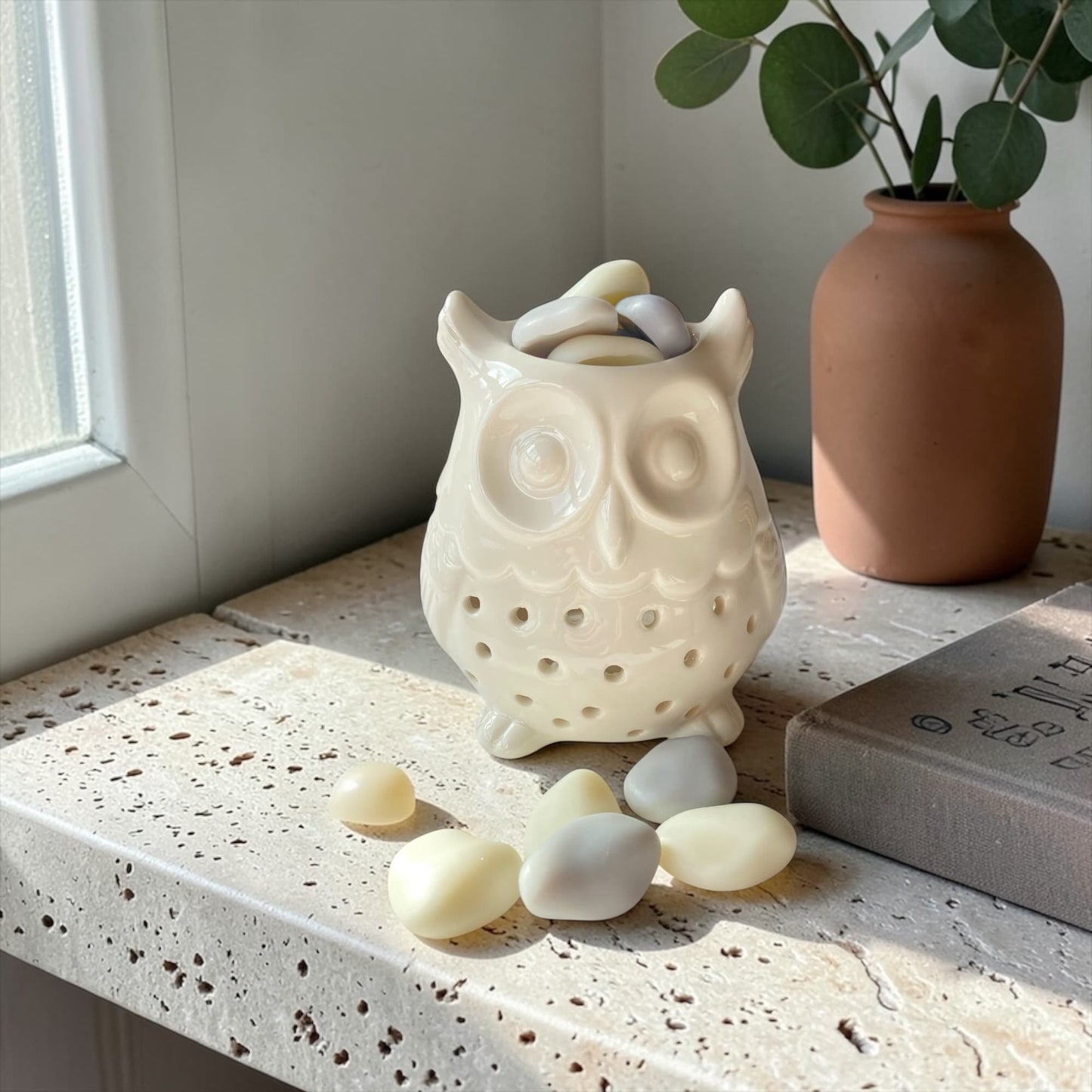 Quemador de cera Noctua decorando un espacio del hogar