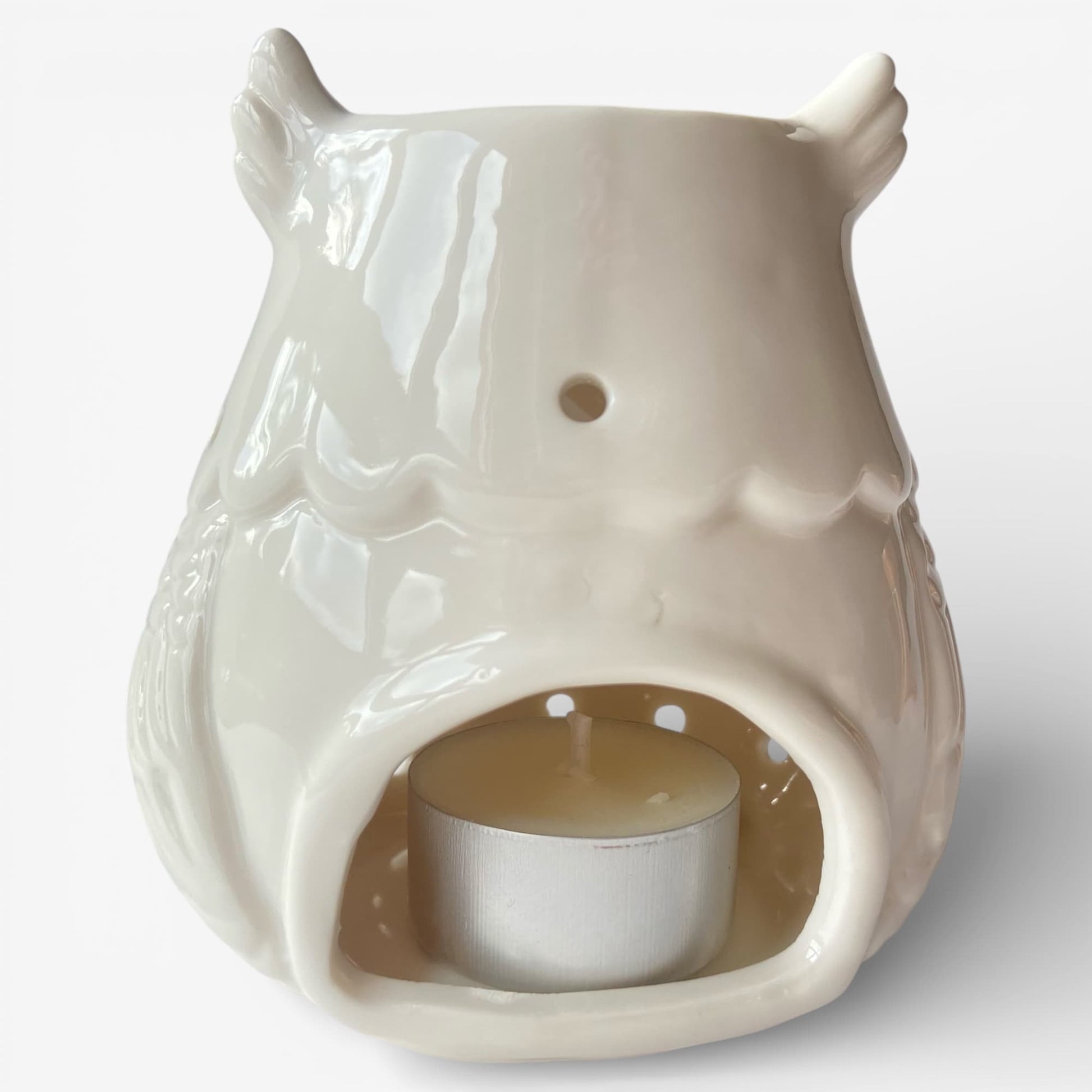 Quemador de cera Noctua con vela tealight en su interior