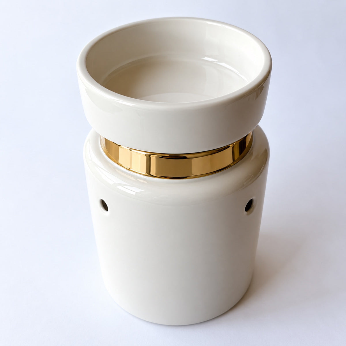 Quemador eléctrico Ivory para wax melts en cerámica blanca y dorada