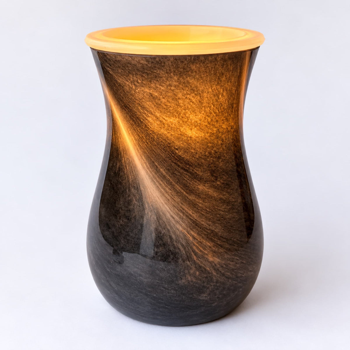 Quemador eléctrico Onyx negro encendido con luz cálida