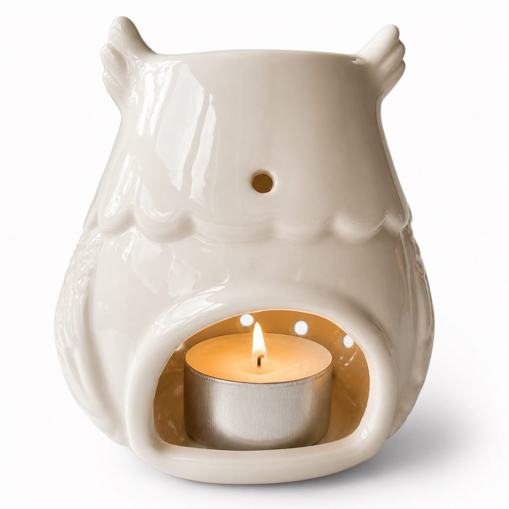 quemador wax melts Búho cerámica blanca con vela de te encendida ayre 