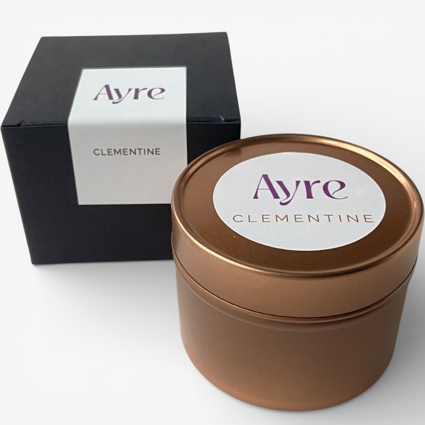 Vela aromática de soja Clementine Ayre con packaging elegante.