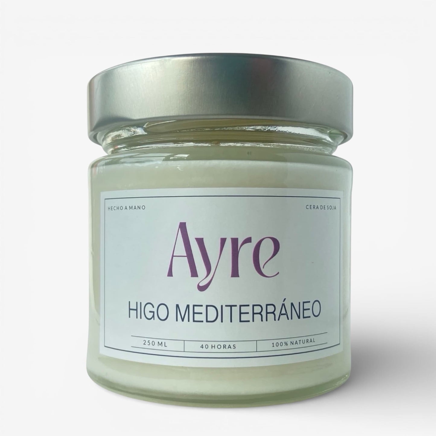 Vela aromática de soja Higo Mediterráneo Ayre en frasco de vidrio con tapa metálica y fragancia fresca y verde.