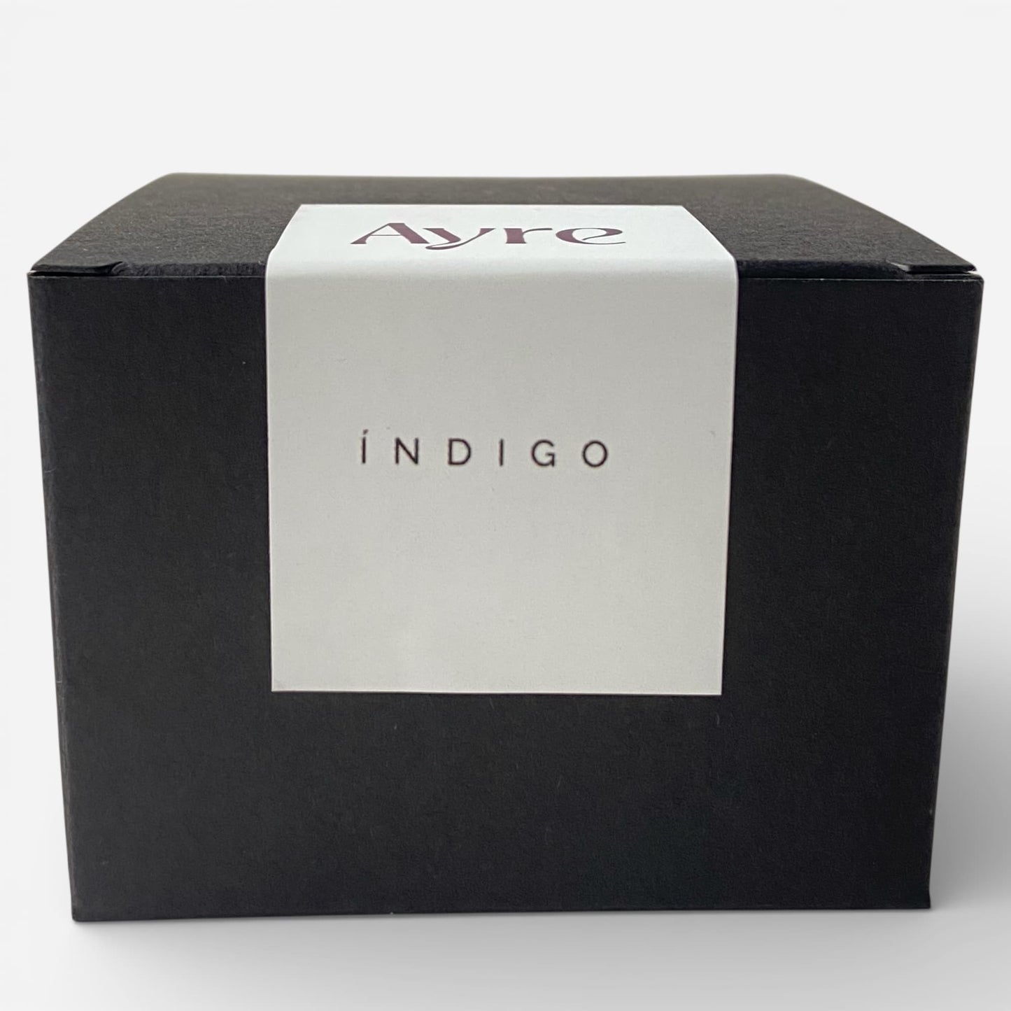 Caja de presentación de la vela aromática de soja Índigo Ayre.