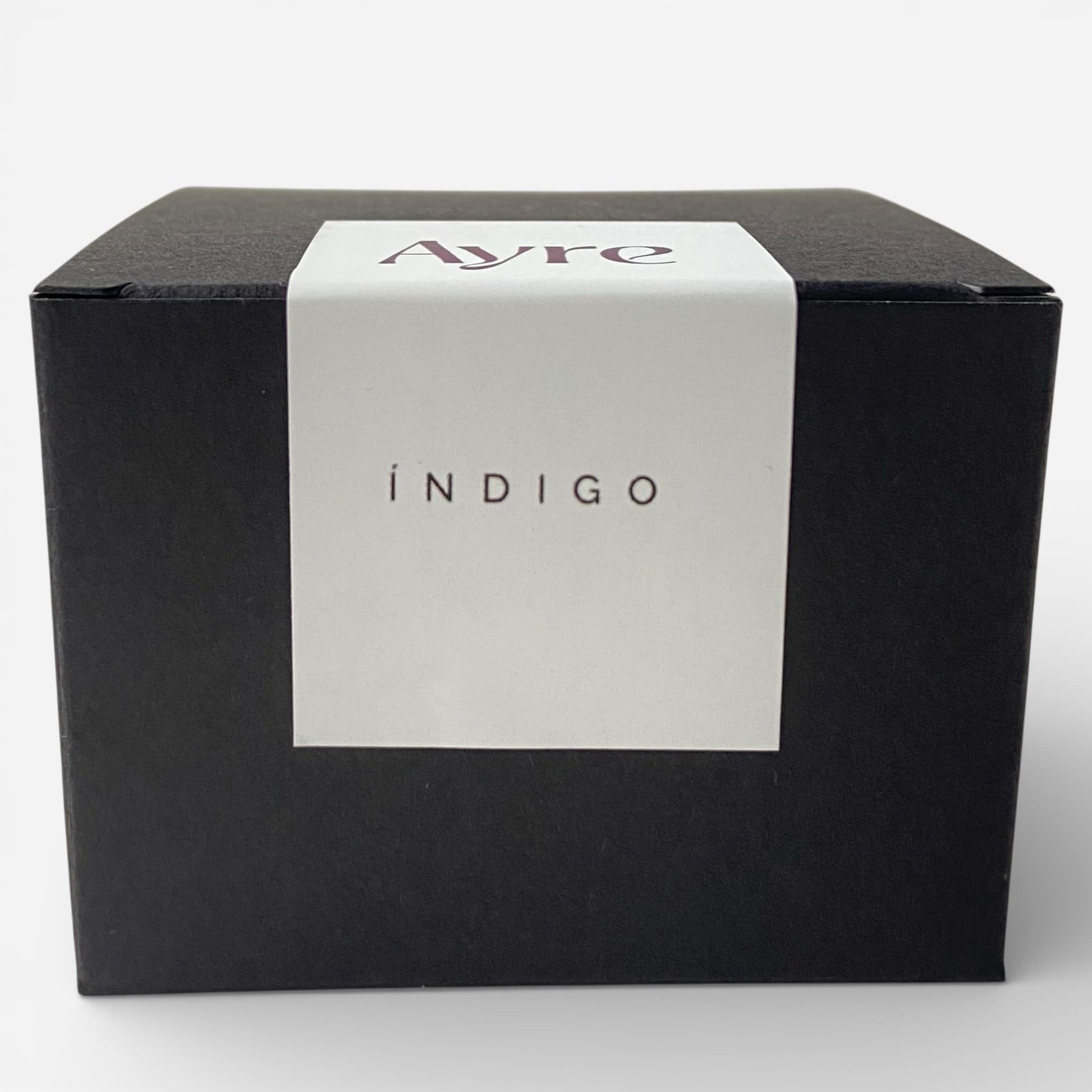 Caja de presentación de la vela aromática de soja Índigo Ayre.