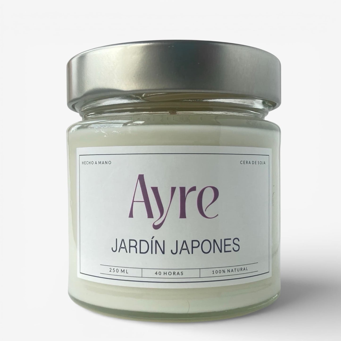 Vela aromática de soja Jardín Japonés Ayre en frasco de vidrio con tapa metálica, fragancia fresca y floral para el hogar