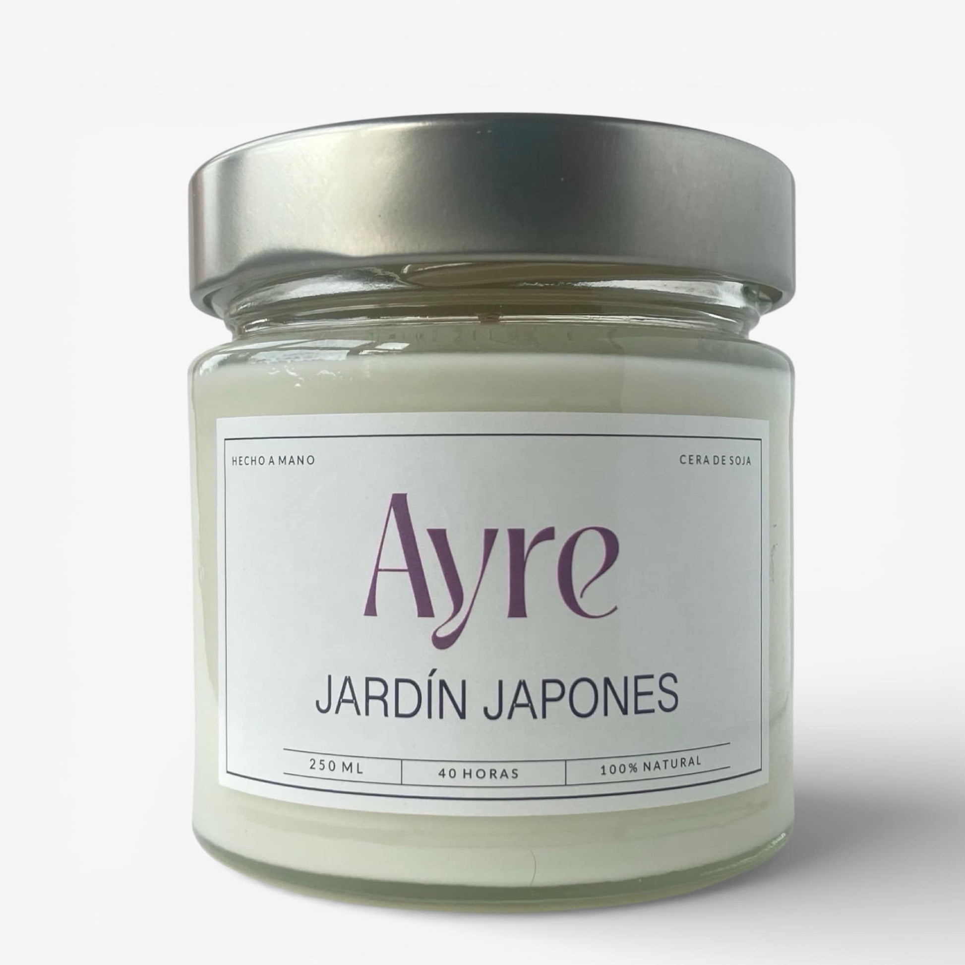Vela aromática de soja Jardín Japonés Ayre en frasco de vidrio con tapa metálica, fragancia fresca y floral para el hogar