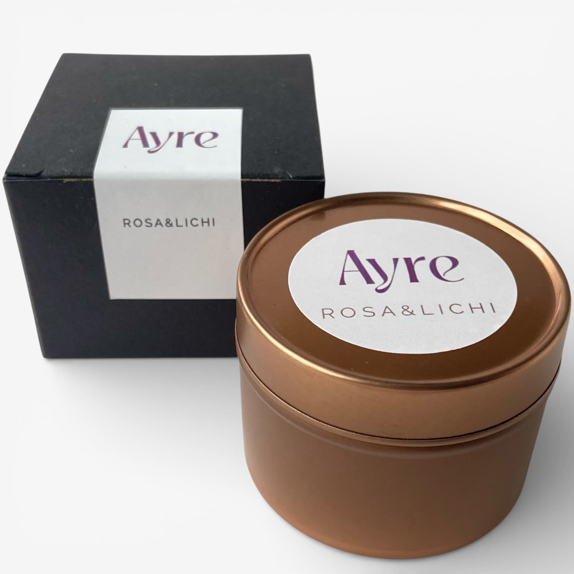 Vela aromática de soja Rosa y Lichi Ayre con caja, ideal para regalo.