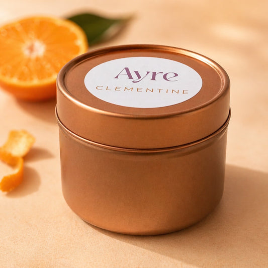 vela de soja clementine ayre en lata color oro rosa