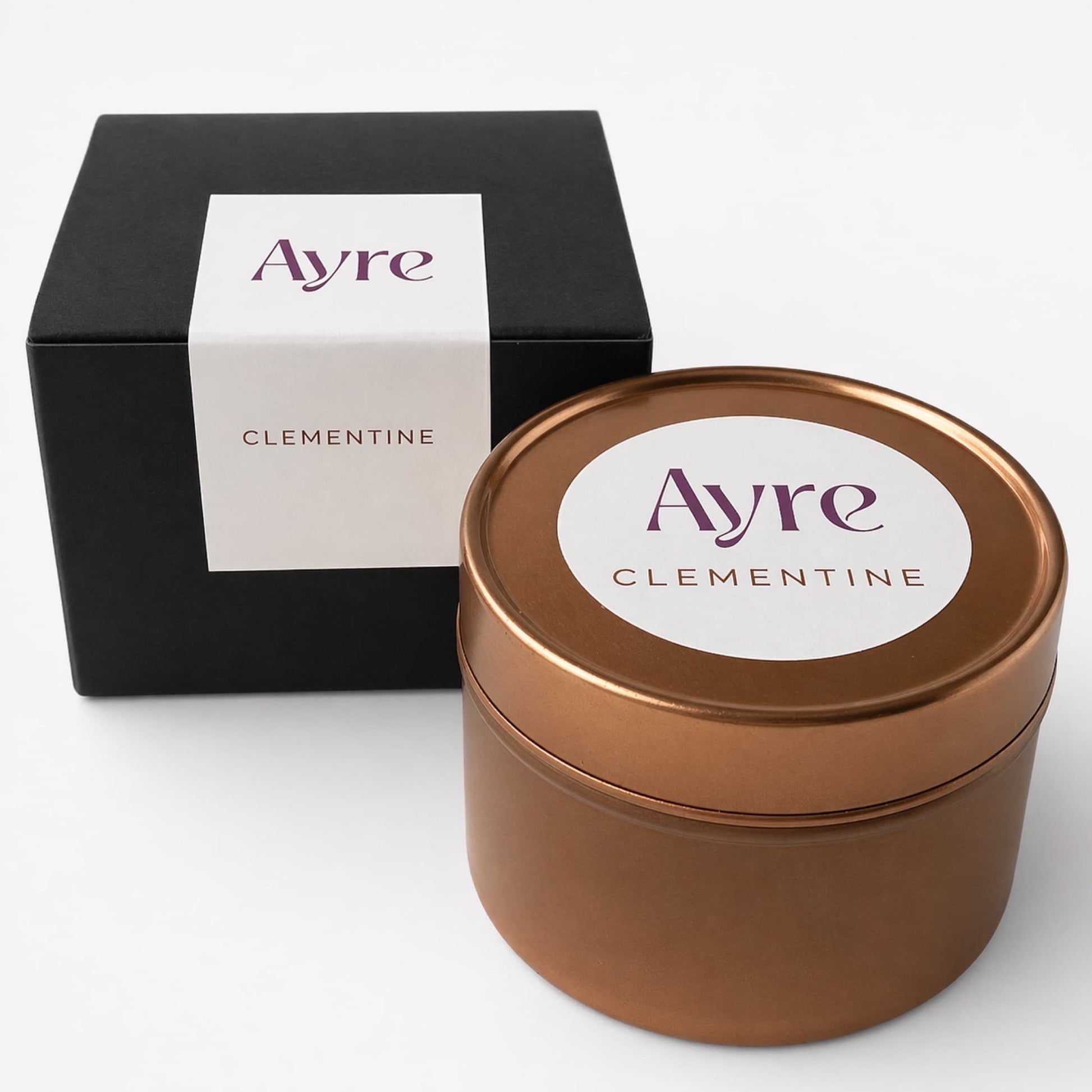 vela de soja clementine ayre con caja en lata oro rosa