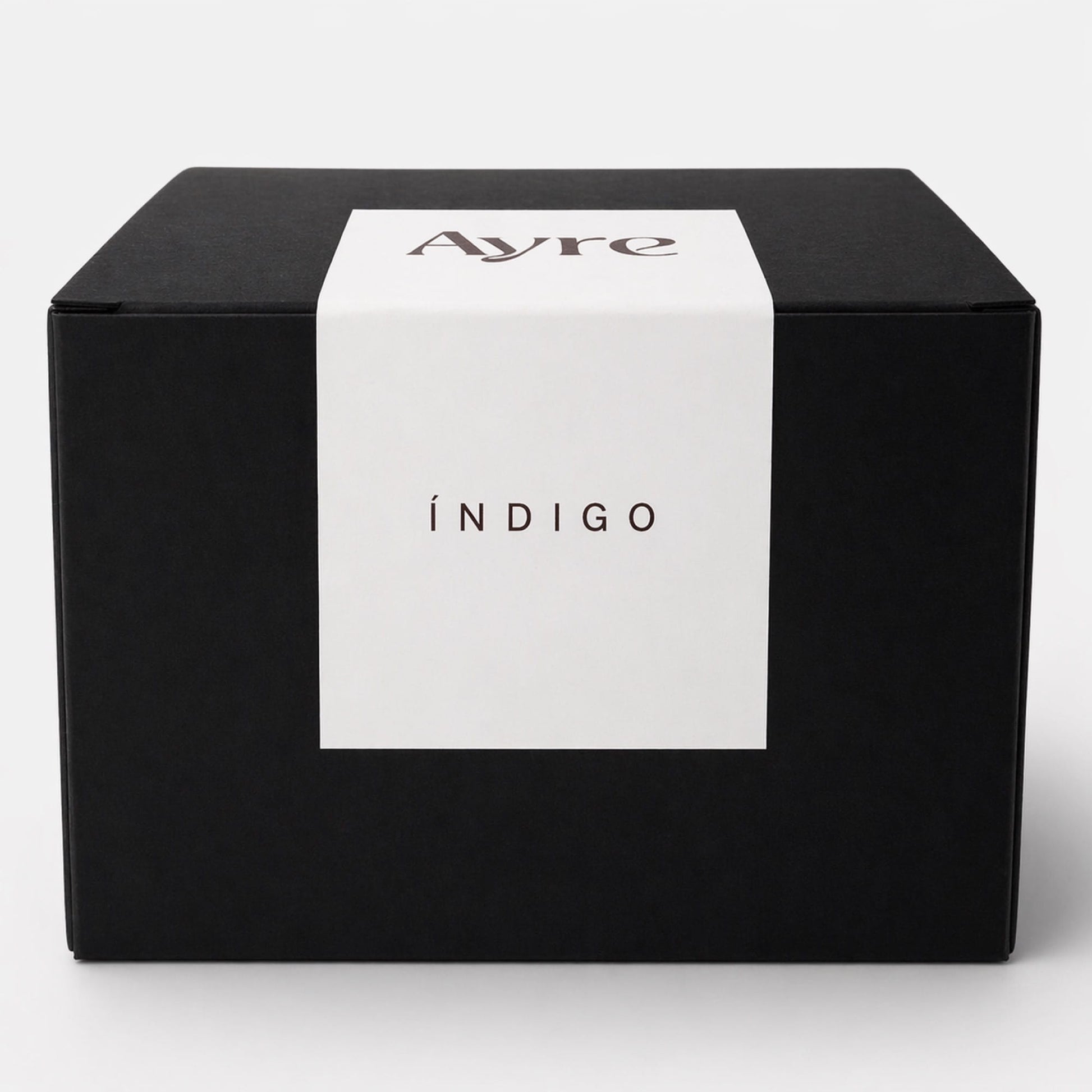 caja premium de vela de soja indigo ayre