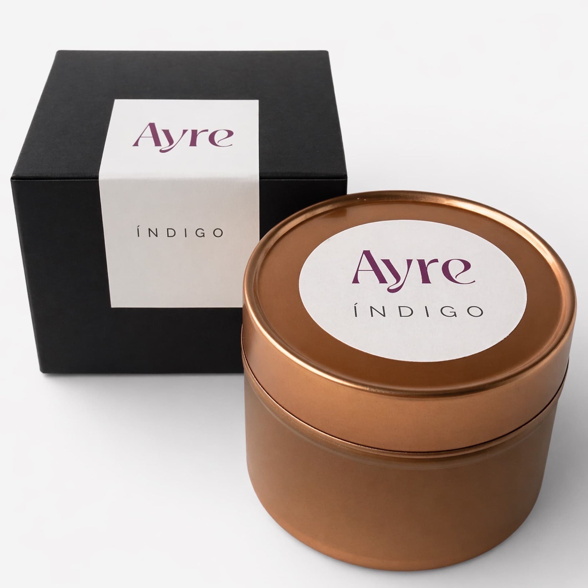 vela de soja indigo ayre con caja en lata oro rosa