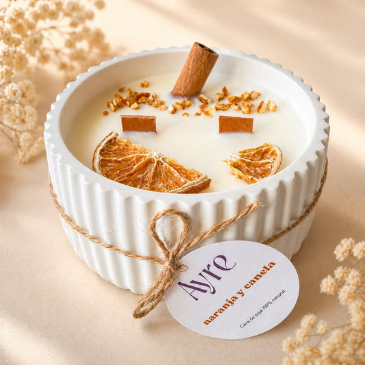 vela aromatica de soja naranja y canela con mecha de madera ayre