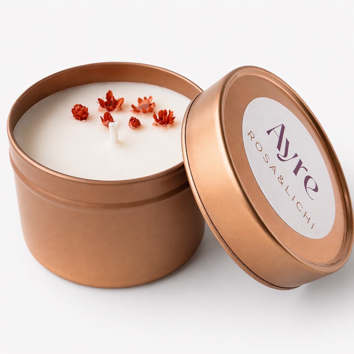 vela de soja rosa y lichi ayre abierta con cera blanca