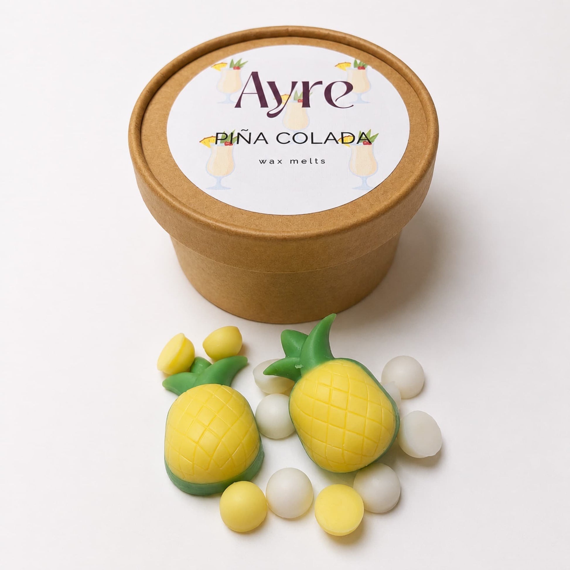 Wax melts Piña Colada de Ayre en envase con mini piñas aromáticas