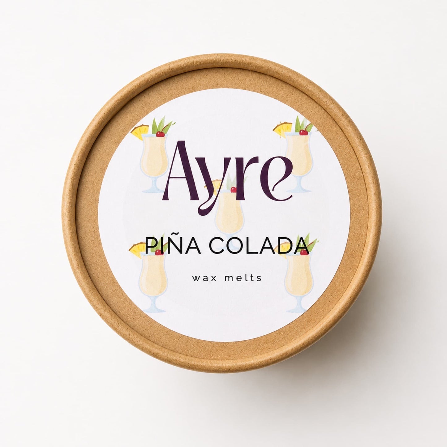Envase de wax melts aromáticos Piña Colada de Ayre visto desde arriba