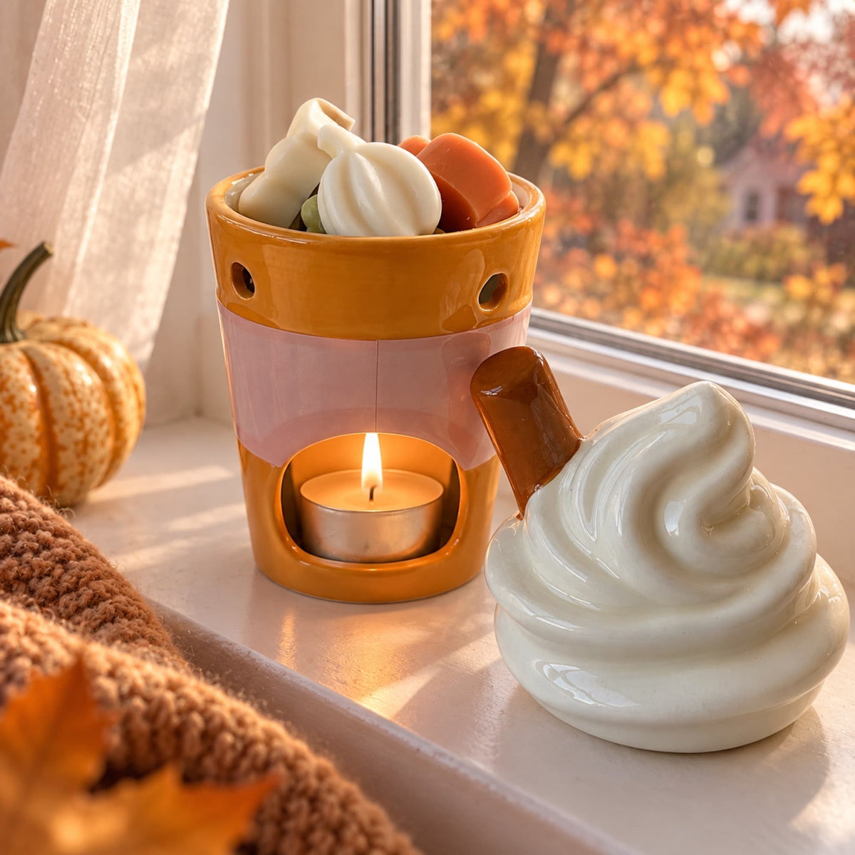 Wax melts Pumpkin Spice de Ayre en quemador con vela encendida