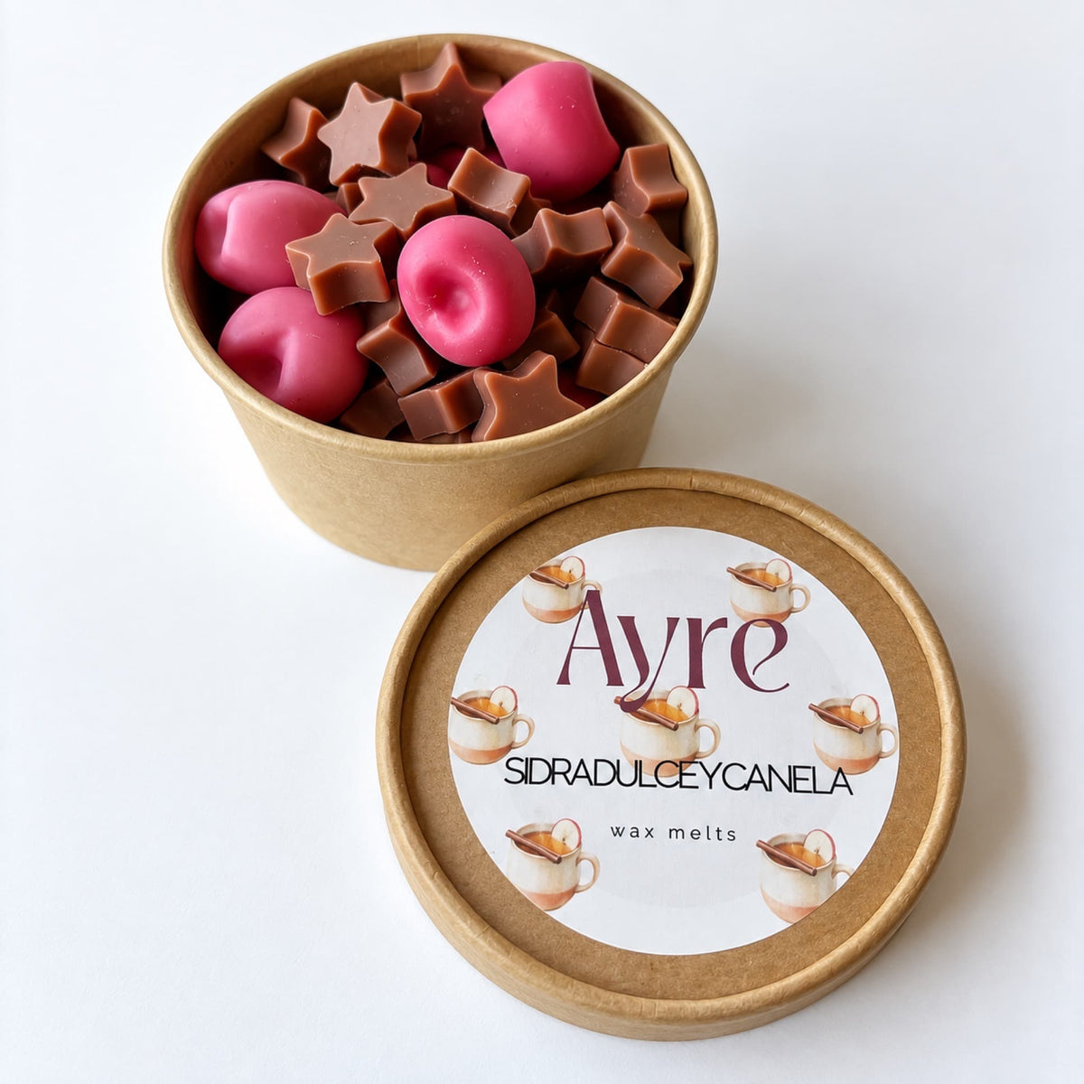 Wax melts Sidra dulce y canela de Ayre en envase kraft con formas de manzana y estrellas