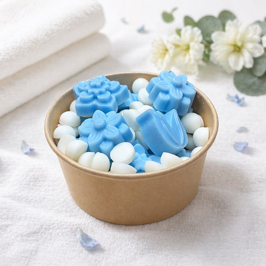 wax melts de soja caricia aroma suavizante azul en tarro kraft con piezas azules y blancas